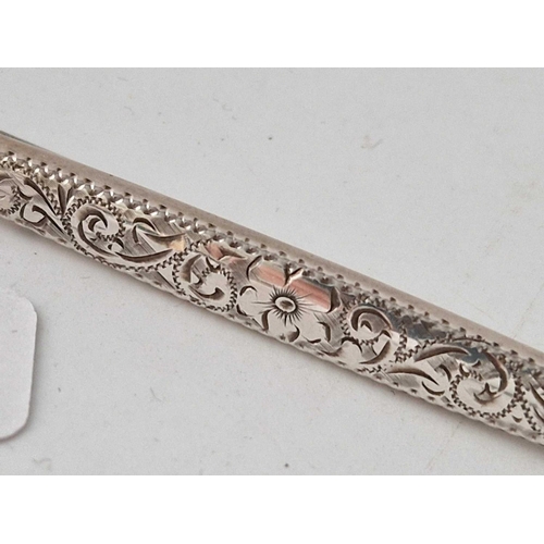 516 - Antique Victorian silver bar brooch with scroll decoration, 87mm in length