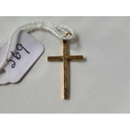 569 - A 9ct cross pendant