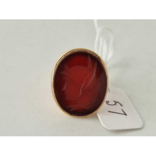 57 - A carnelian set ring with classic head intaglio, 9ct, size N, 4.9 g