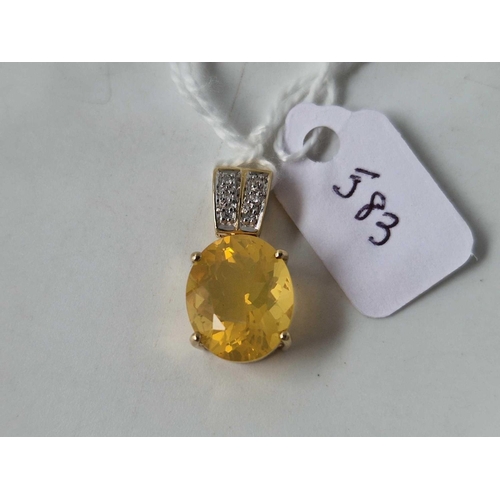 583 - A pendant with yellow stone and diamond set bail, 9ct, 2.9 g