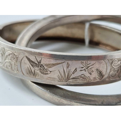 592 - Two hinged silver bangles, 35 g