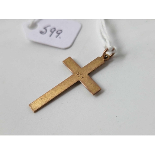 599 - A 9ct cross pendant