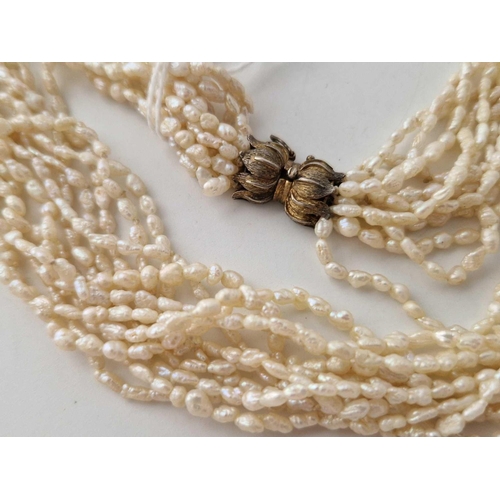 607 - A antique fresh water pearl multi strand necklace with silver clasp 16 inch