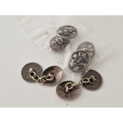 608 - Two pairs of silver cufflinks