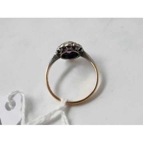 627 - A 9ct and silver purple and white stone dress ring, size O