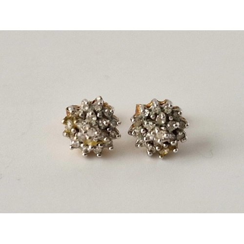 638 - A pair of diamond cluster ear studs, 9ct