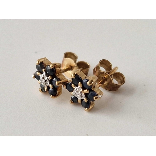 639 - A pair of sapphire and diamond ear studs, 9ct