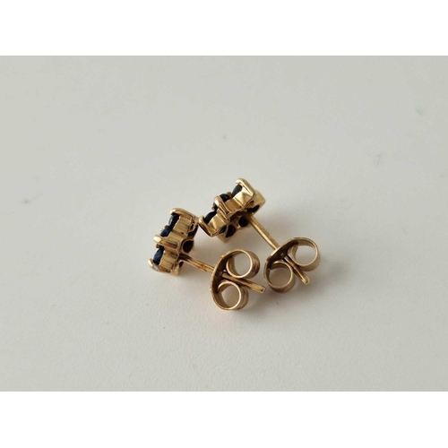 639 - A pair of sapphire and diamond ear studs, 9ct