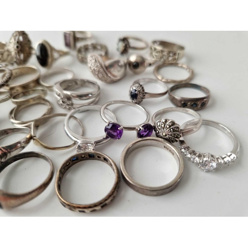 668 - x35 assorted silver rings, 117 g