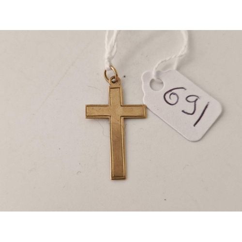 691 - A 9ct cross