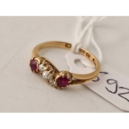 692 - A ruby and diamond ring 18ct gold size L 2.1 g