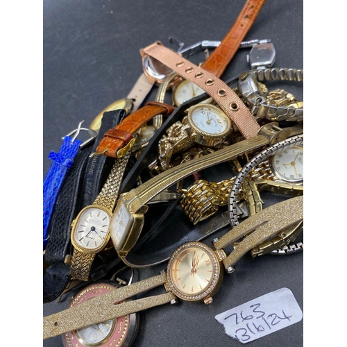 763 - Twenty one assorted ladies and gents wrist watches