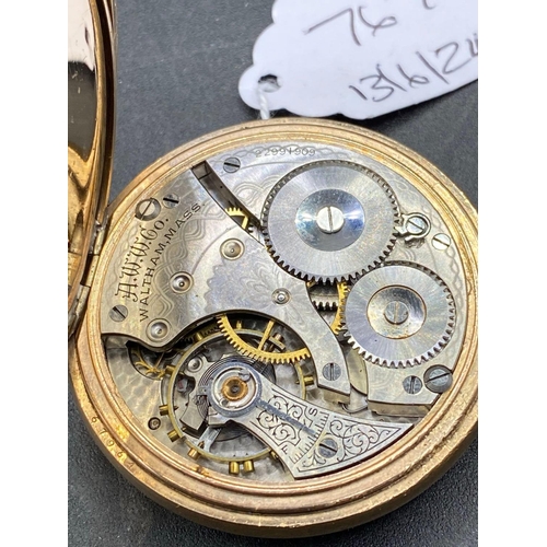 767 - A gilt gents pocket watch by WALTHAM with seconds dial