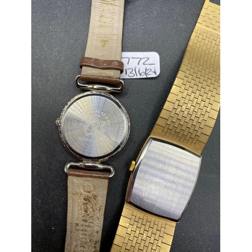 772 - A unisex GIORGIO Beverly hills quartz wrist watch together with a ACCURIST example