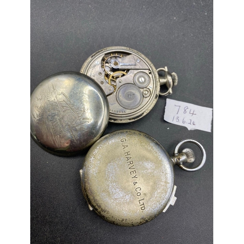 784 - A Elgin pocket watch with train design on rear and one other