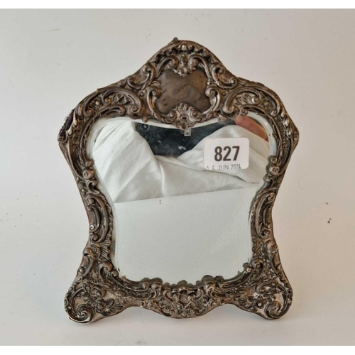 827 - A Fancy Dressing Table Mirror Embossed with Scrolls Easle Back 8� high
Birmingham 1904 by HM