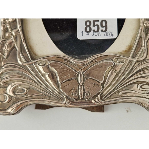 859 - An Art Nouveau style frame decorated with flower motifs, 8