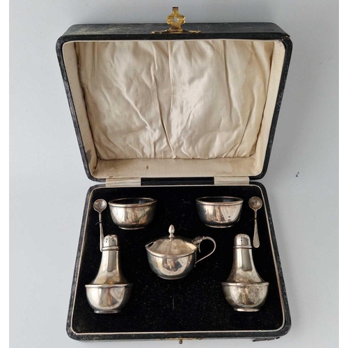 869 - A five piece cruet set plus spoons in fitted box, Birmingham 1932