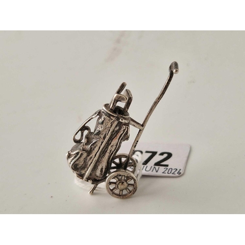 872 - A miniature golfing trolley with import mark, 2 1/4