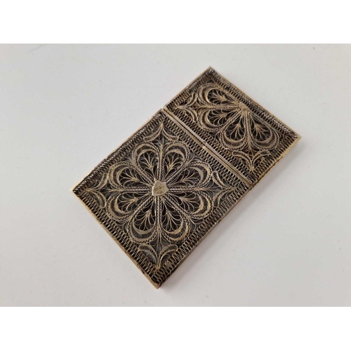 887 - A 19th Century silver filigree card case with pull off end, 3.5