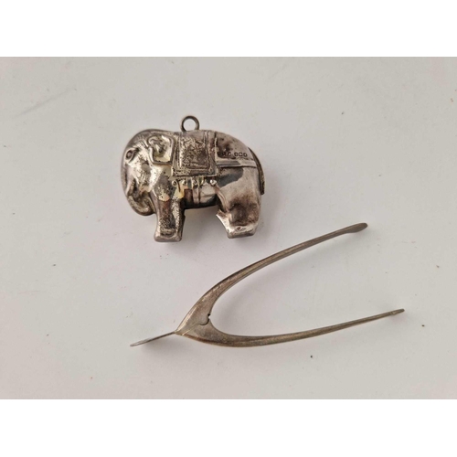 907 - A child's rattle in the form of an Elephant, Birmingham 1947 by WHC and a pair of wishbone sugar ton... 