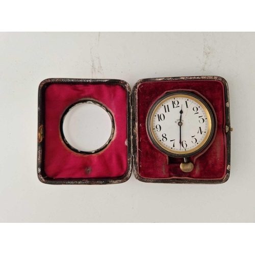 909 - A eight day travelling clock in a silver case, London 1919