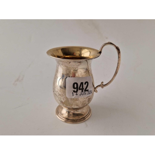 942 - A plain christening mug with loop handle, 3.5 inches high, Birmingham 1959, 55 g