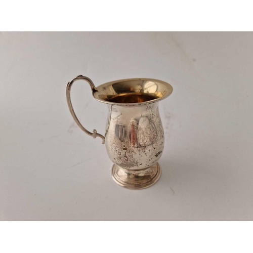 942 - A plain christening mug with loop handle, 3.5 inches high, Birmingham 1959, 55 g