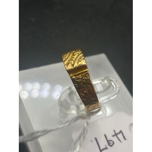 497 - A fancy 18ct gold ring, size K, 2.7 g