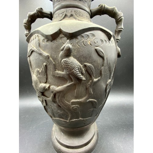 1820 - A Chinese bronze vase with carved panels, 13 inches high