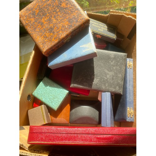 702 - A large box of assorted fitted boxes