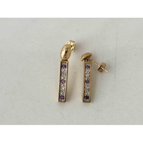 103 - A pair of diamond and amethyst drop  earrings 9ct 2.6 gms