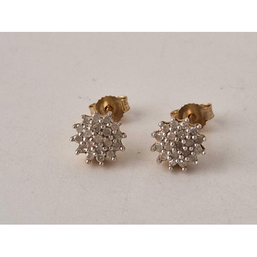 105 - A pair of diamond earrings each .10 carat 9ct