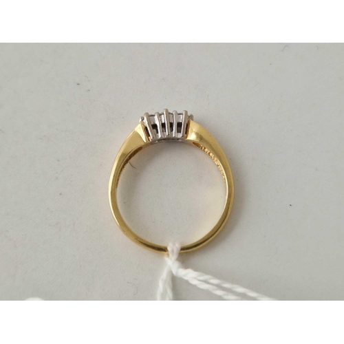 11 - A three stone diamond ring 18ct gold size Q 4.1 gms