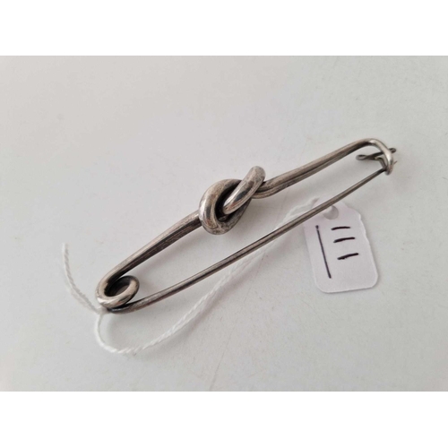 111 - A large silver knot brooch length 75mm