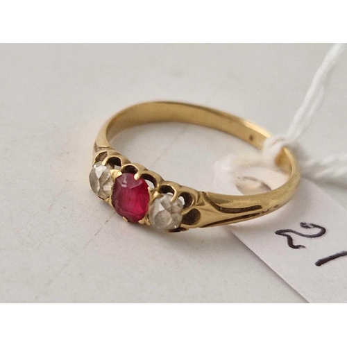 21 - A ruby and diamond three stone ring 18ct gold size Q