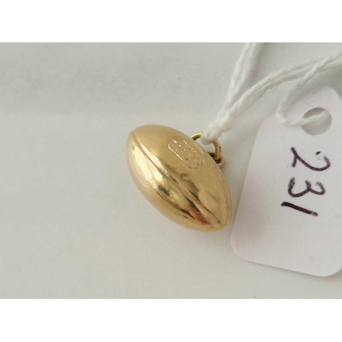 231 - A rugby ball charm 9ct