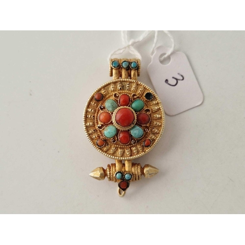 3 - A silver gilt pendant claps with coral and turquoise stones one small stone missing clasp