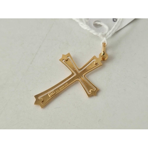 88 - A 18ct gold cross 1.4 gms