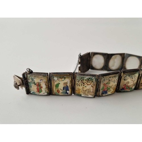 9 - A silver and MOP ten panel bracelet with oriental scenes 7 inch