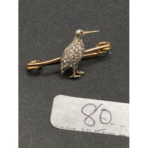 80 - AN ANTIQUE GOLD & DIAMOND SNIPE BROOCH 3G