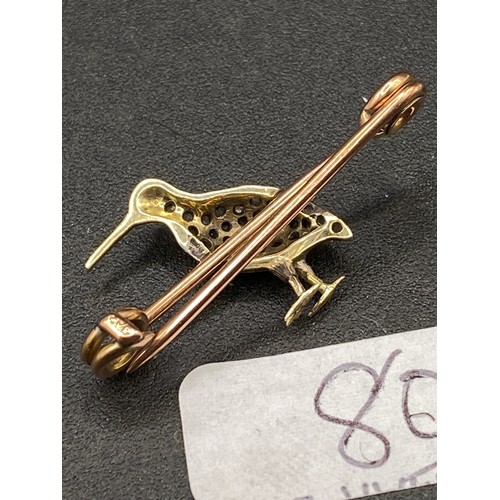 80 - AN ANTIQUE GOLD & DIAMOND SNIPE BROOCH 3G