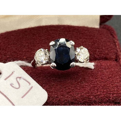 151 - A IMPRESSIVE DIAMOND AND SAPPHIRE THREE STONE RING 18CT WHITE GOLD SAPPHIRE 10MM X 8 MM TWO DIAMONDS... 