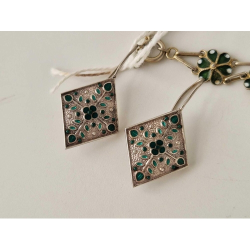 113 - A silver and enamel bracelet together with silver and enamel earrings