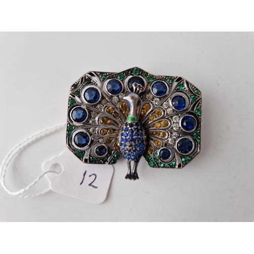 12 - A silver and paste peacock brooch