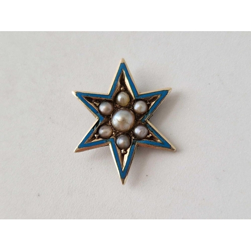 121 - A antique star shaped pin with pearls and enamel, 18ct