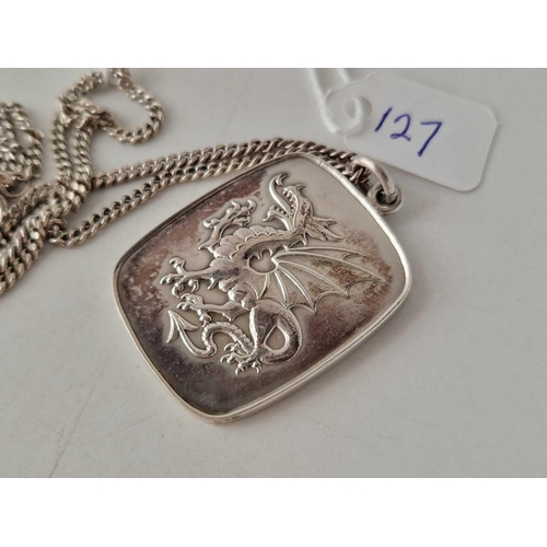 127 - A silver welsh dragon pendant on chain 16 inch 29 gms