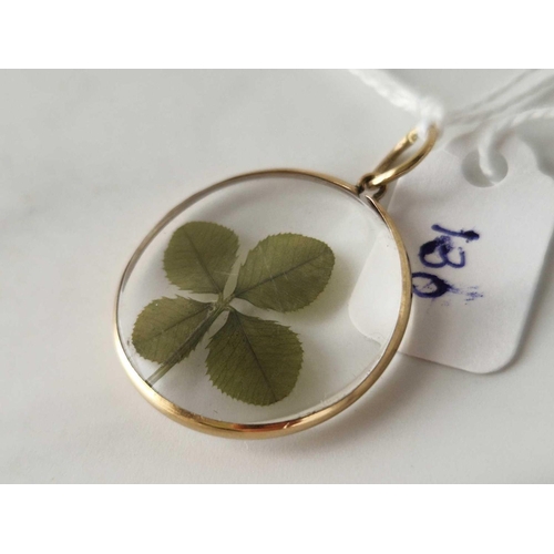 130 - A mounted locket with four leaf clover 9ct