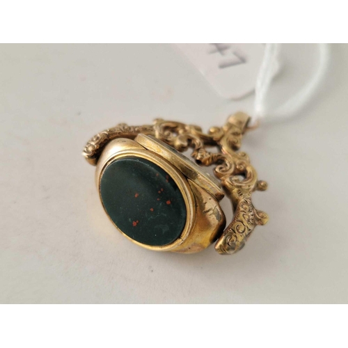 147 - A gilt three sided swivel fob blood stone citrine and onyx