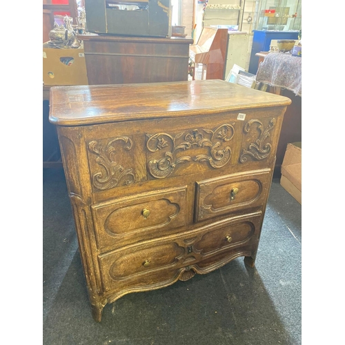 1705 - An early 19th Century oak shaped front chest with lift up top 33 inches wide